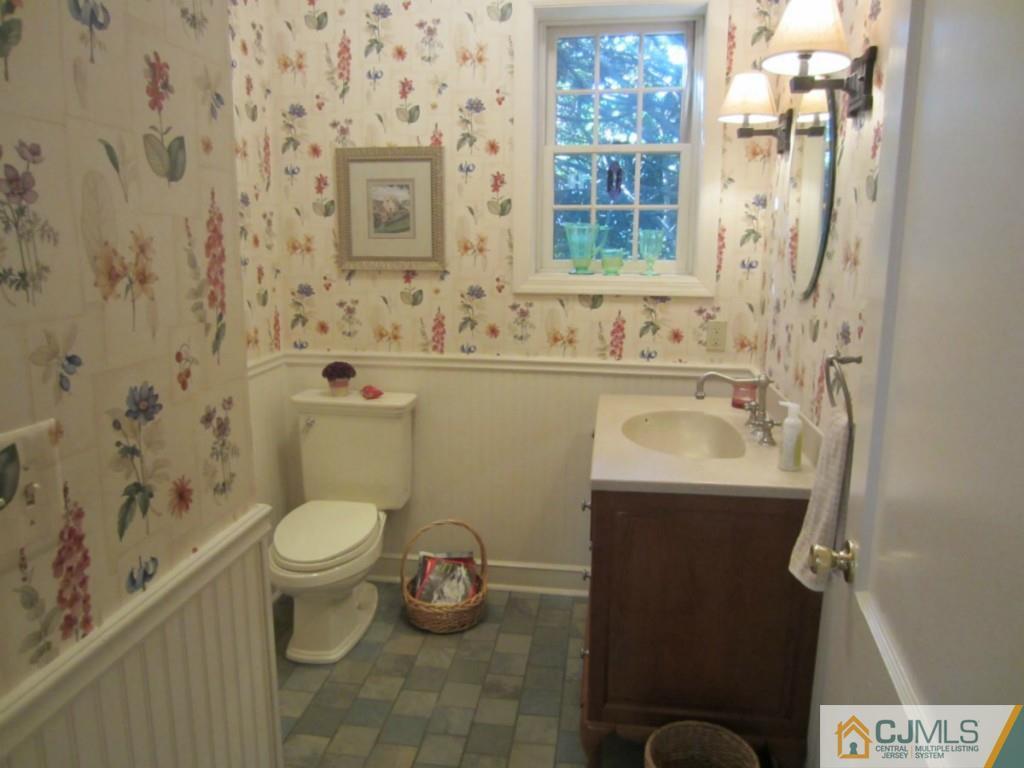 4 Edgebrook Road New Brunswick, NJ 08901 - Photo 15 of 22 a bathroom with a sink toilet and shower