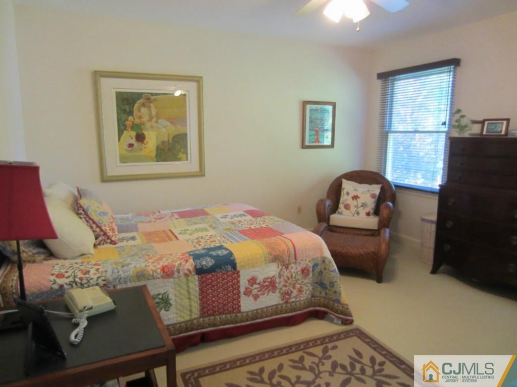 4 Edgebrook Road New Brunswick, NJ 08901 - Photo 20 of 22 a bedroom with bed and a window