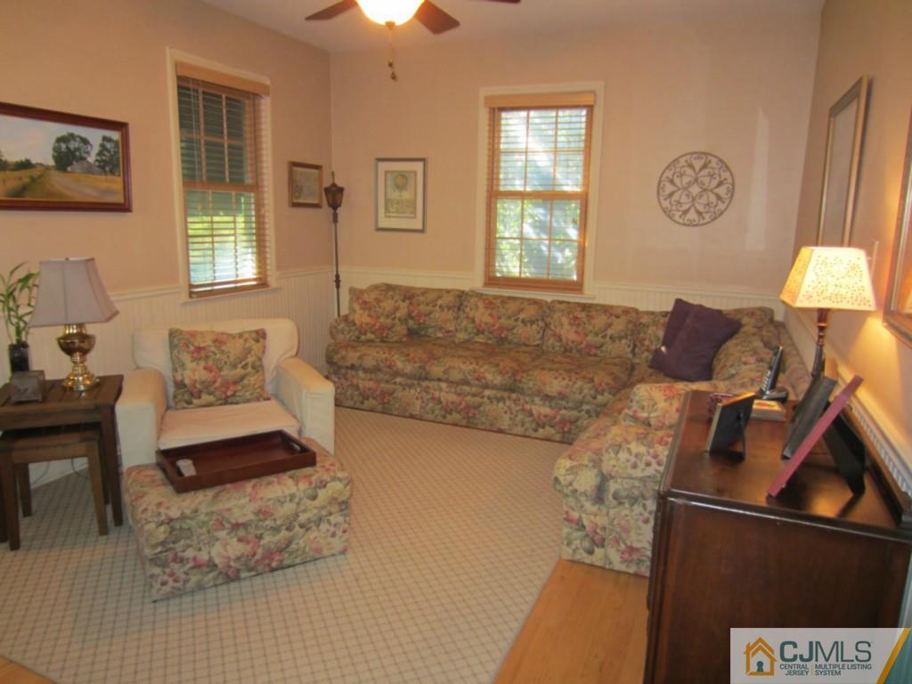 4 Edgebrook Road New Brunswick, NJ 08901 - Photo 10 of 22 a living room with furniture and a window