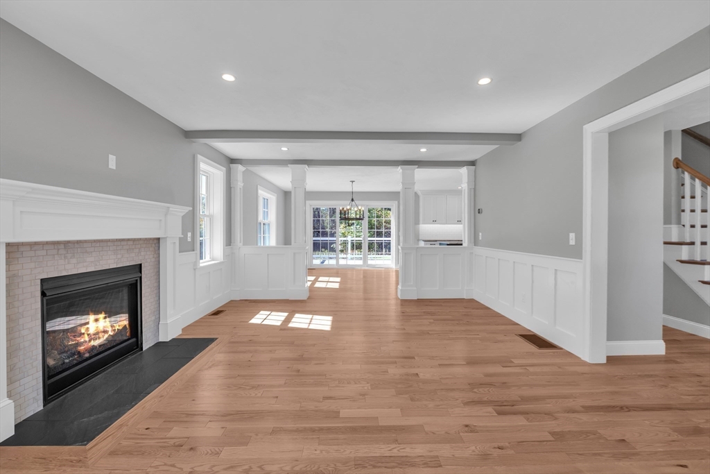271 Glenwood Road Rutland, MA 01543 - Photo 3 of 36 a view of an empty room with wooden floor fireplace and a window