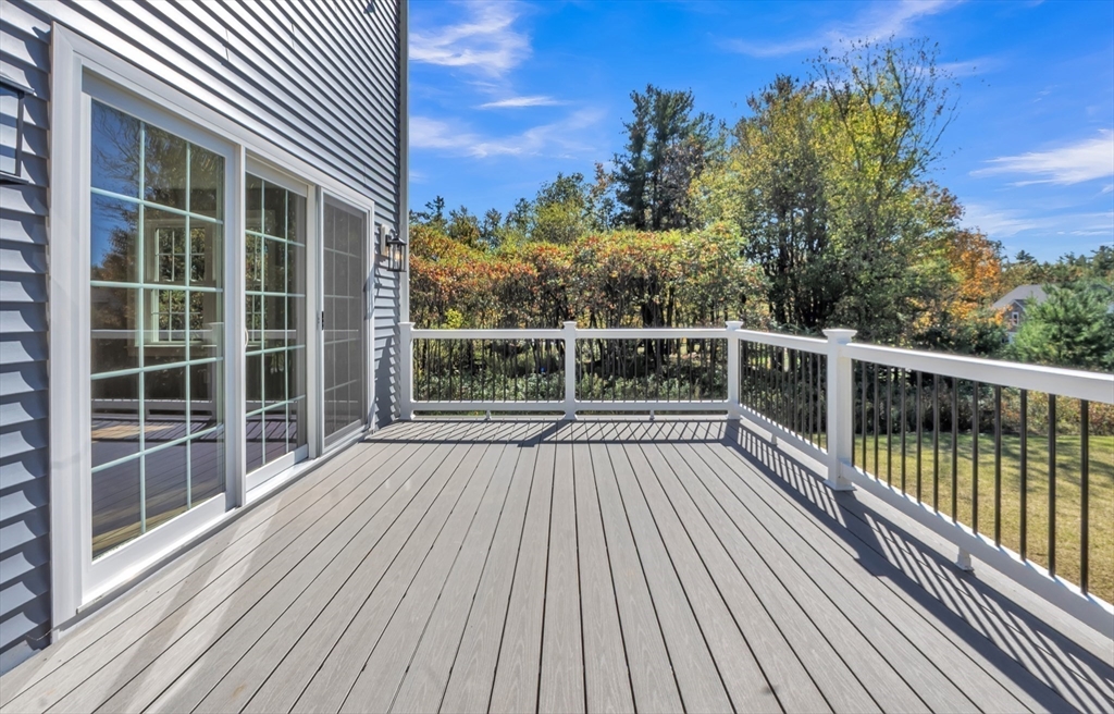 271 Glenwood Road Rutland, MA 01543 - Photo 33 of 36 a view of balcony with wooden floor and fence