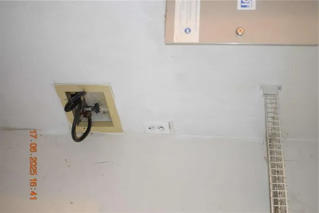 a bathroom with a bath tub and mirror