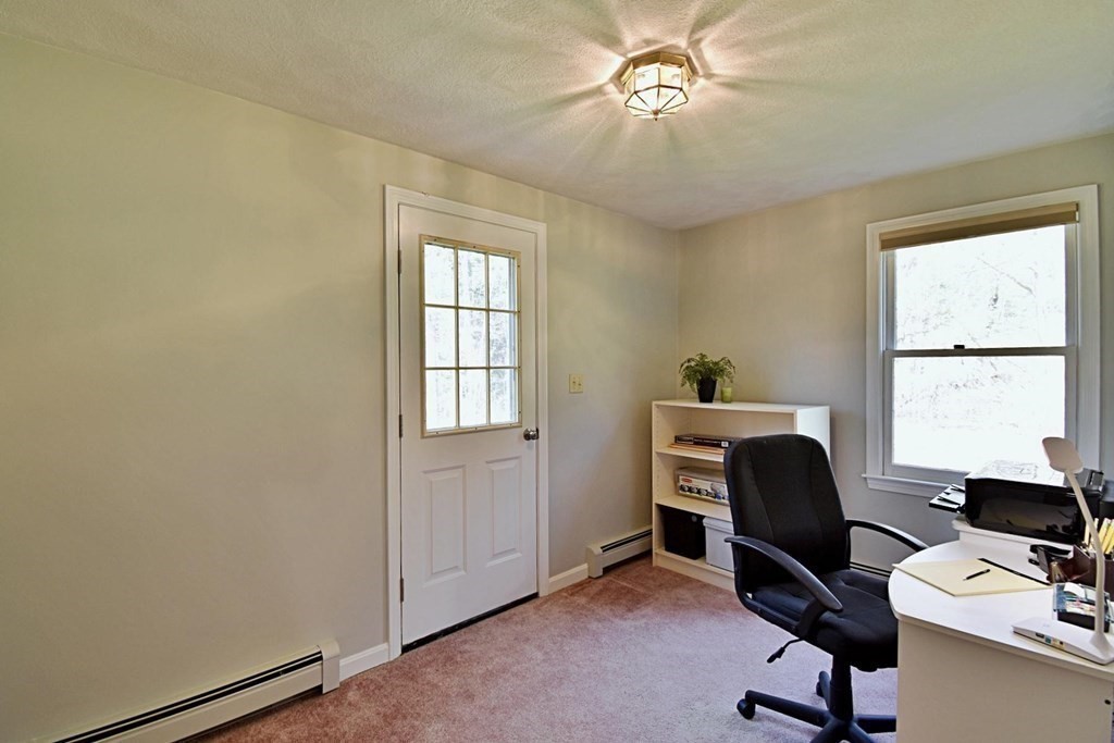 9 Chard Road Tyngsborough, MA 01879 - Photo 16 of 38 a view of a workspace with furniture and a window