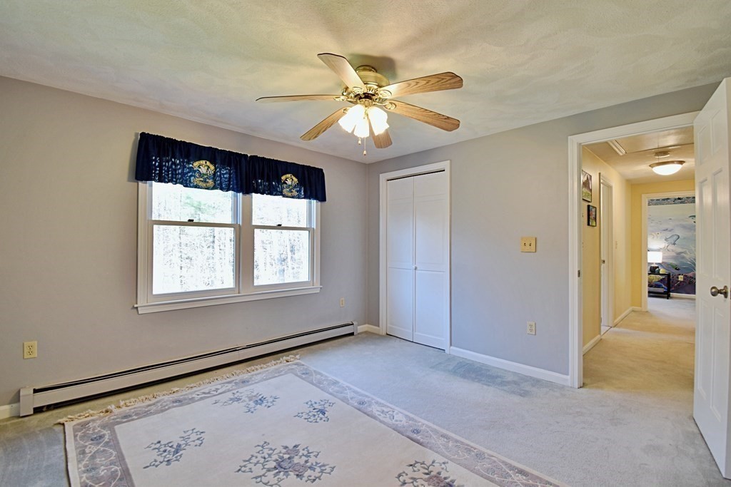 9 Chard Road Tyngsborough, MA 01879 - Photo 30 of 38 a view of an empty room with a window