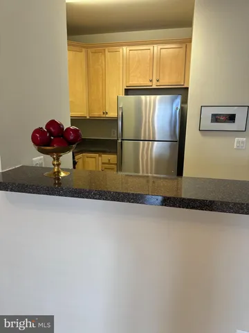 a kitchen with a stove and a microwave