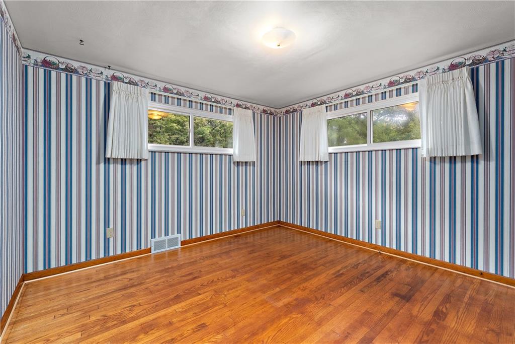 110 Forresta Drive Butler, PA 16002 - Photo 13 of 25 a view of a black and white wooden floor in a room