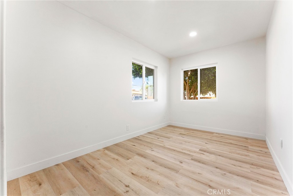 10872 Flower Avenue Stanton, CA 90680 - Photo 17 of 26 an empty room with windows