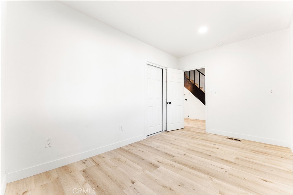 10872 Flower Avenue Stanton, CA 90680 - Photo 18 of 26 a view of a room with a ceiling fan