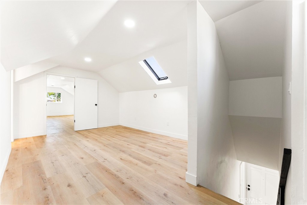 10872 Flower Avenue Stanton, CA 90680 - Photo 19 of 26 a view of empty room with wooden floor