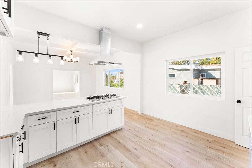 10872 Flower Avenue Stanton, CA 90680 - Photo 9 of 26 a room with white cabinets and window