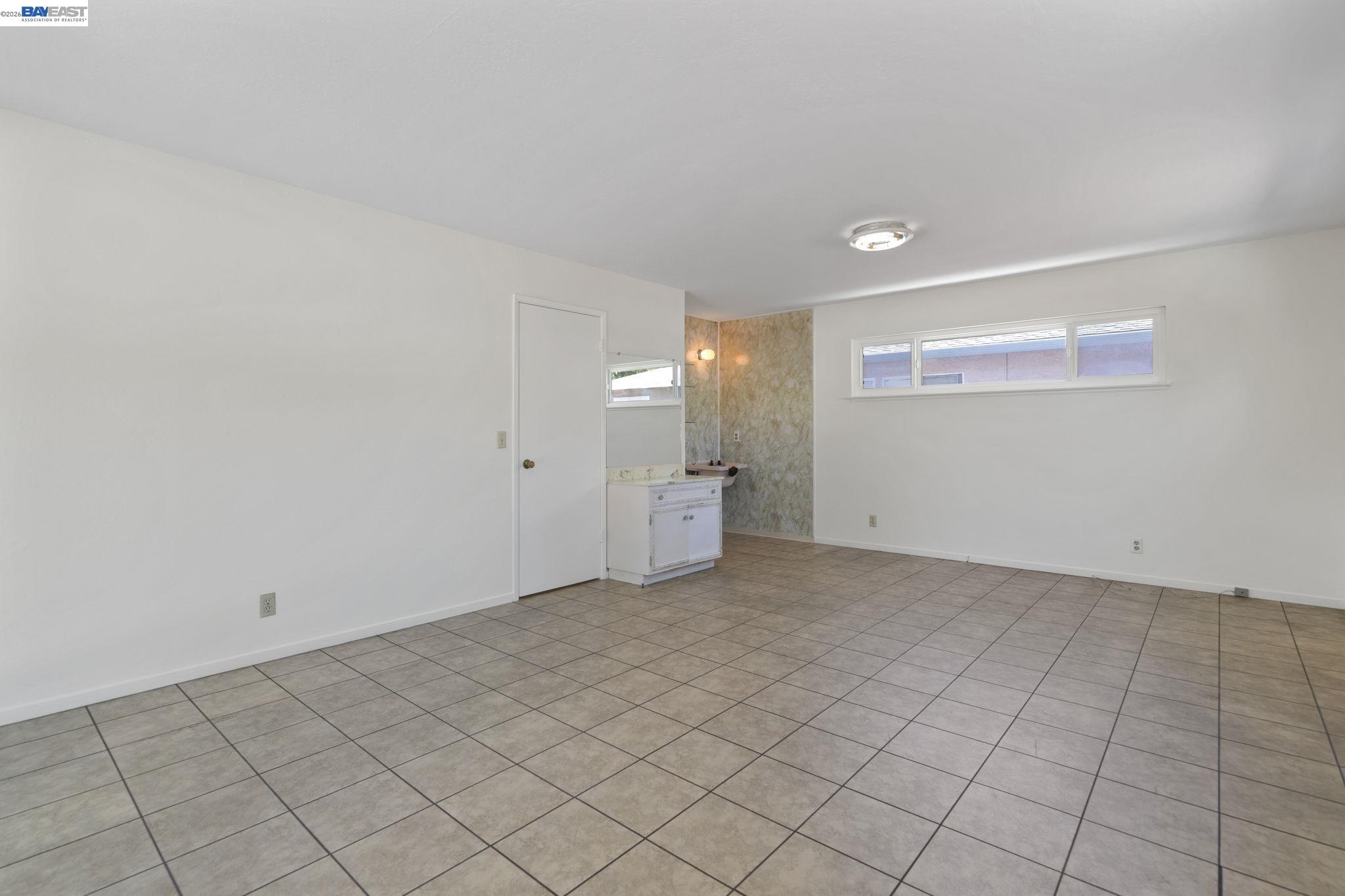 40272 Davis Street Fremont, CA 94538 - Photo 14 of 46 a view of an empty room and window