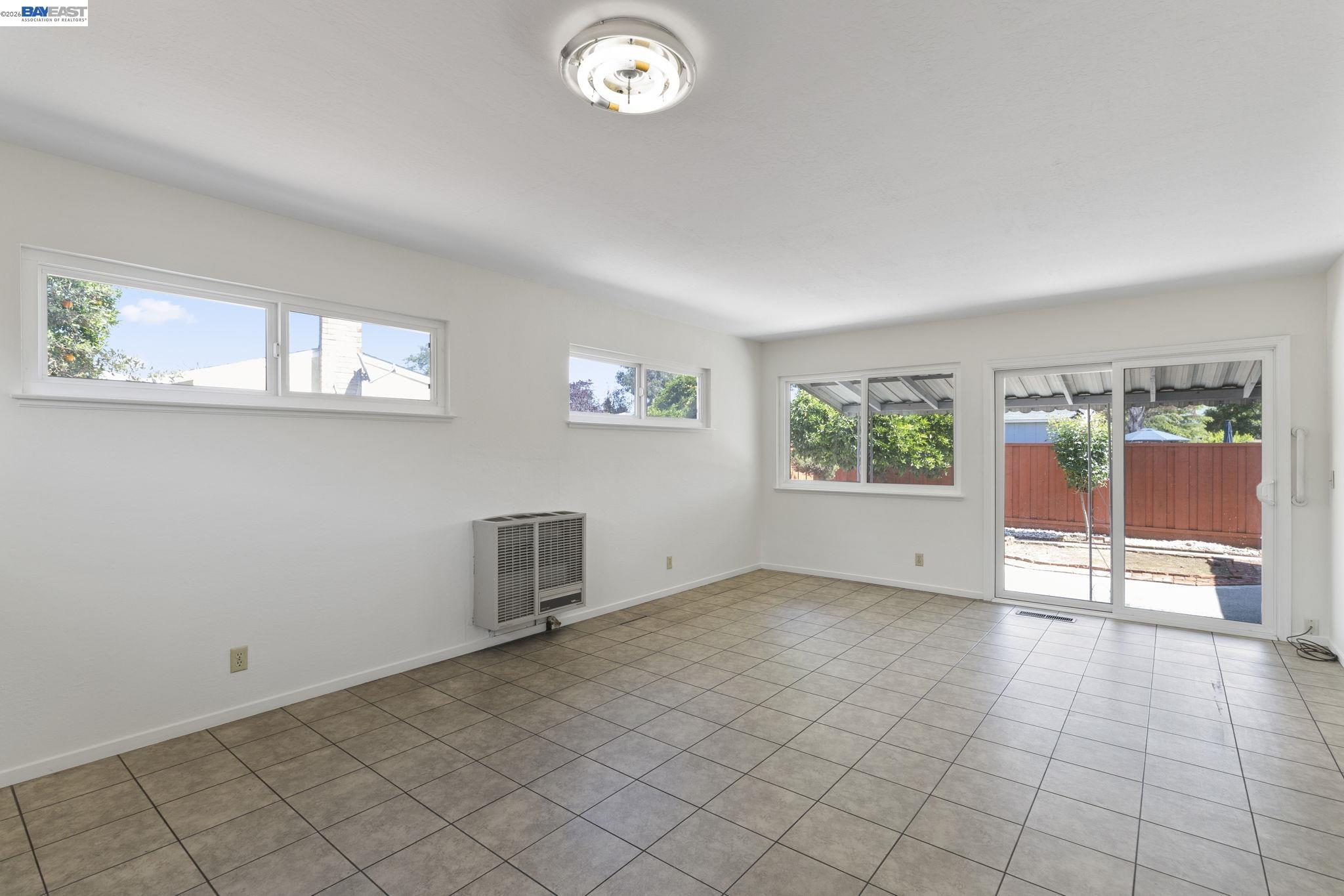 40272 Davis Street Fremont, CA 94538 - Photo 15 of 46 an empty room with windows