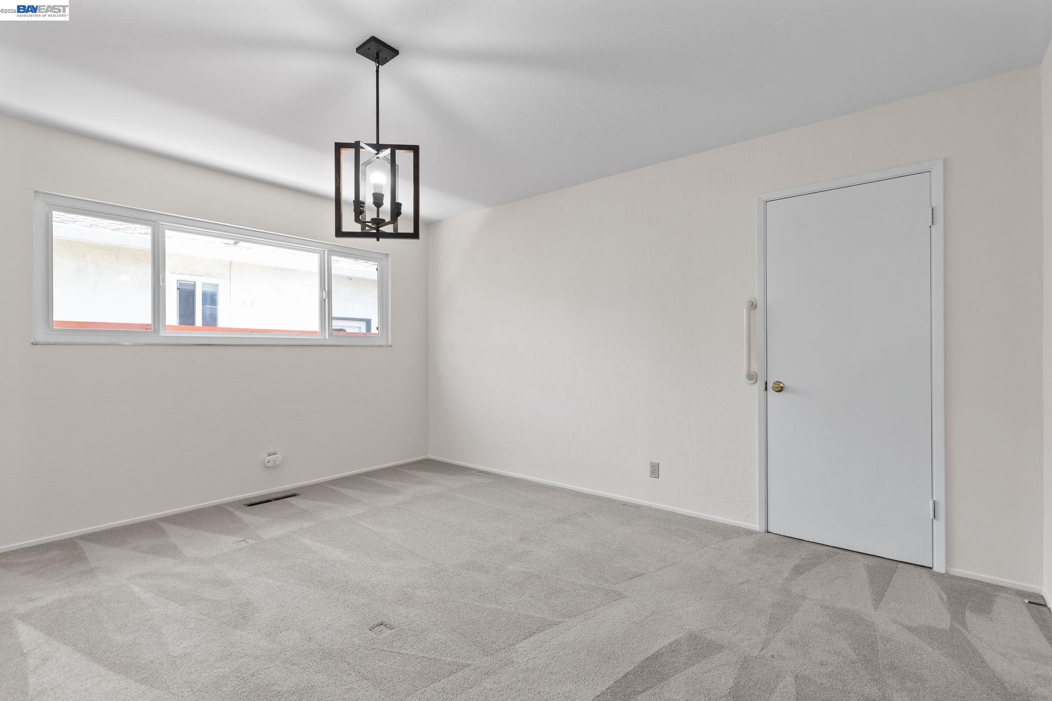 40272 Davis Street Fremont, CA 94538 - Photo 16 of 46 a view of an empty room with a window