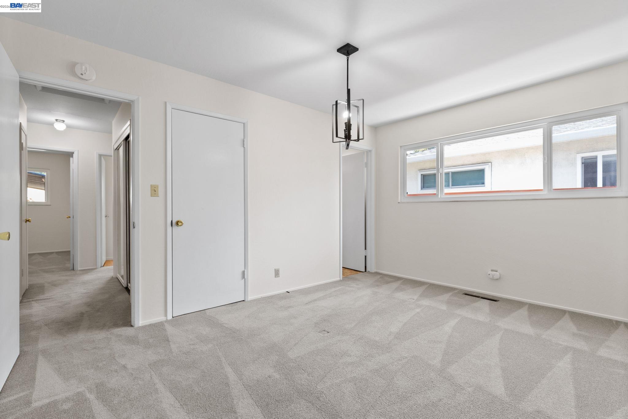 40272 Davis Street Fremont, CA 94538 - Photo 19 of 46 a view of empty room with windows