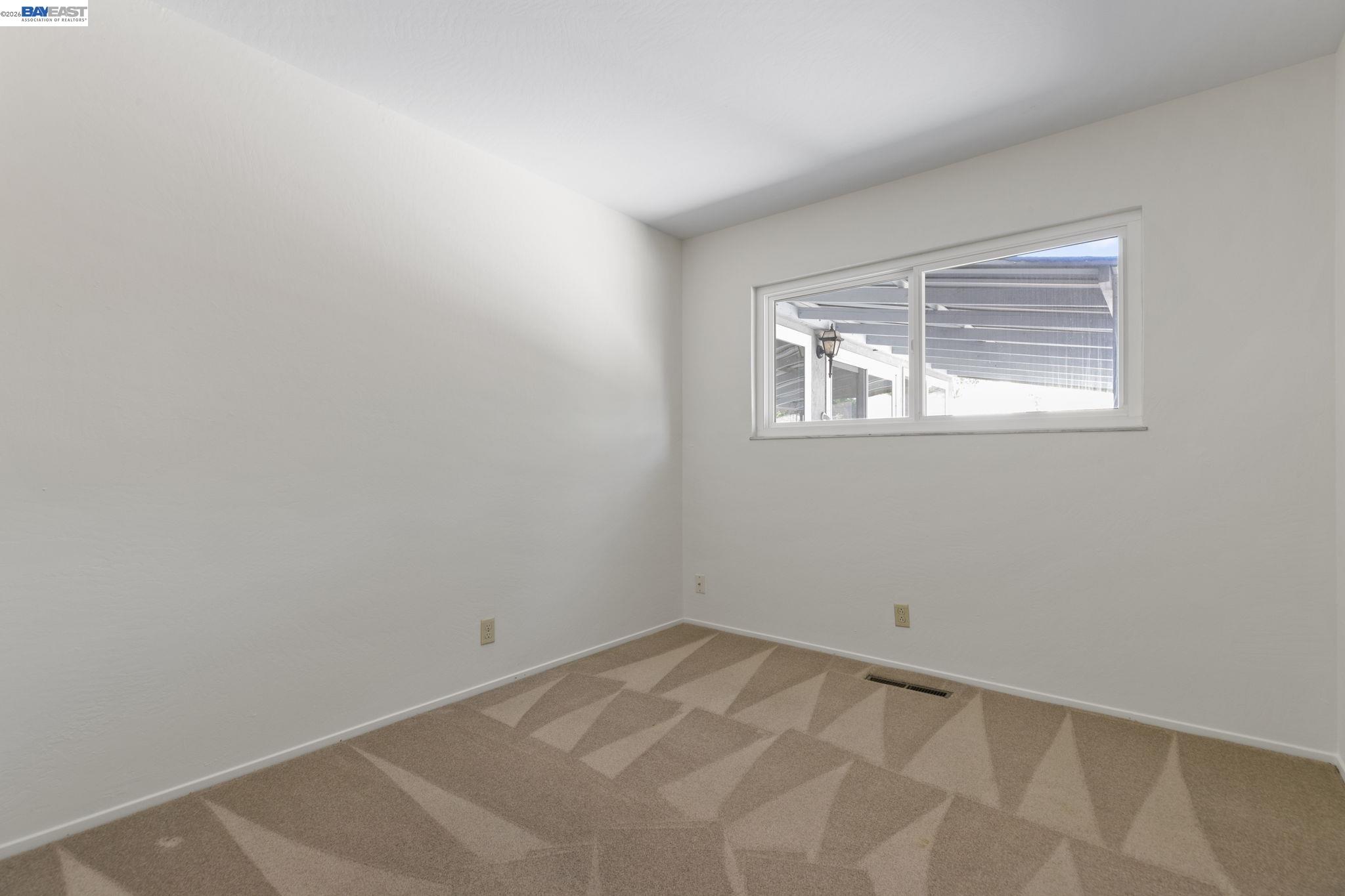 40272 Davis Street Fremont, CA 94538 - Photo 29 of 46 an empty room with a window
