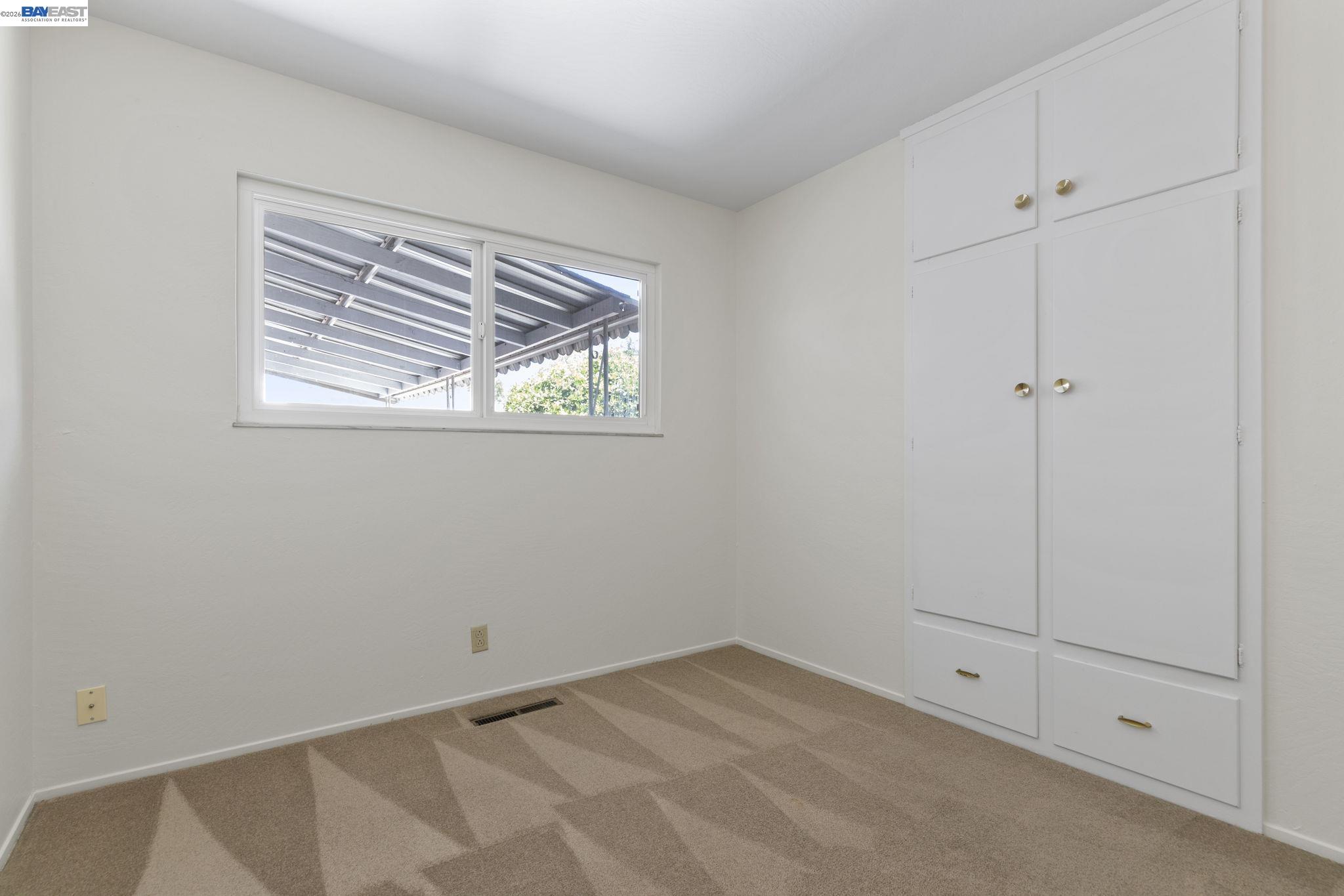 40272 Davis Street Fremont, CA 94538 - Photo 30 of 46 a view of an empty room with a window