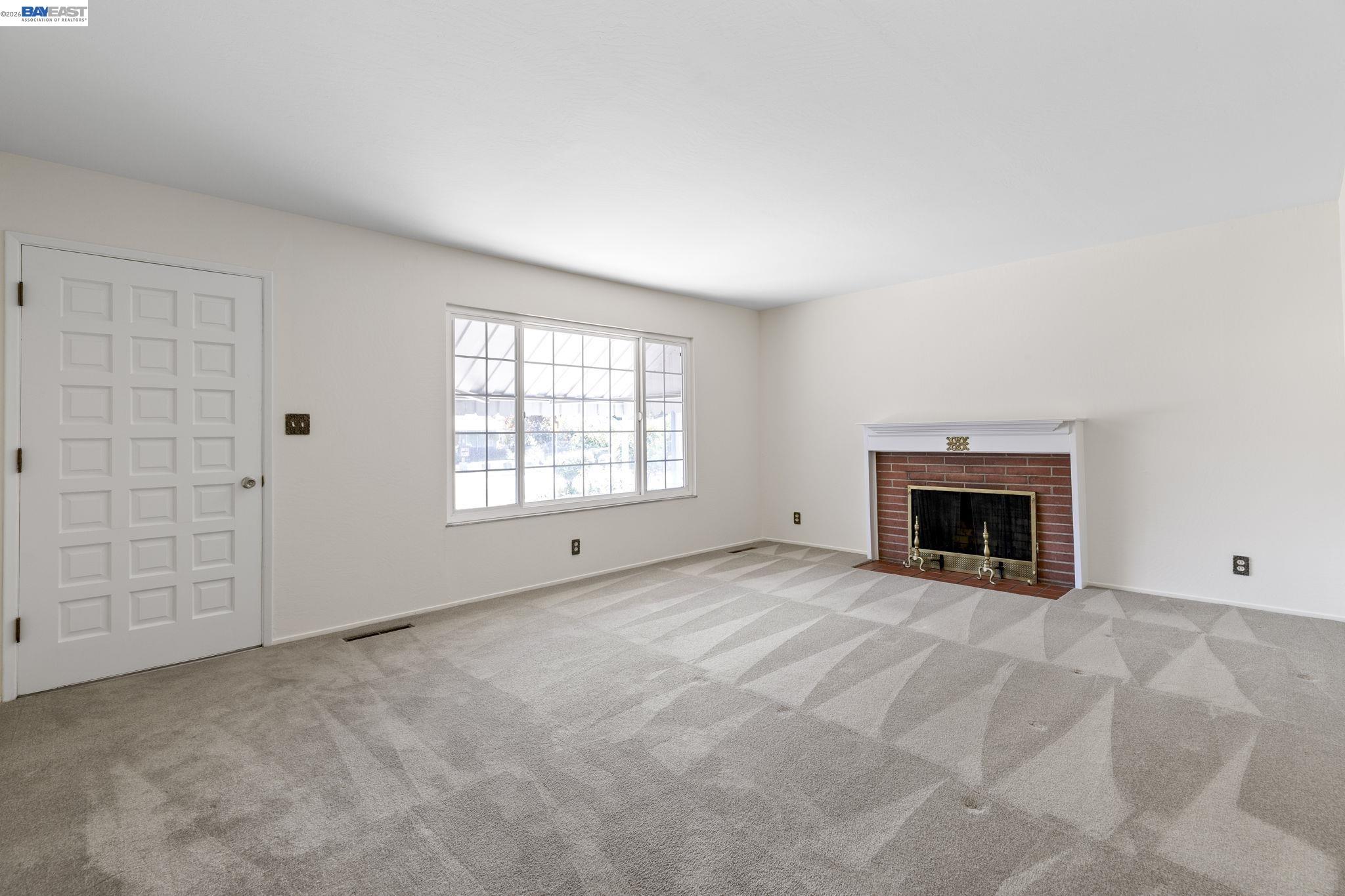 40272 Davis Street Fremont, CA 94538 - Photo 4 of 46 an empty room with windows