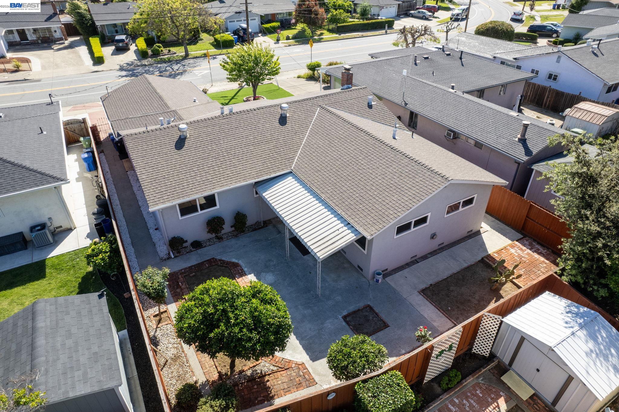 40272 Davis Street Fremont, CA 94538 - Photo 46 of 46 an aerial view of a house with garden space and a patio