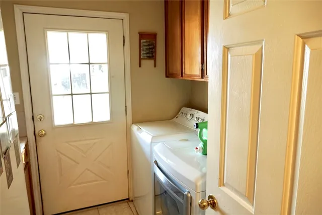 a bedroom with a bed a closet and dresser