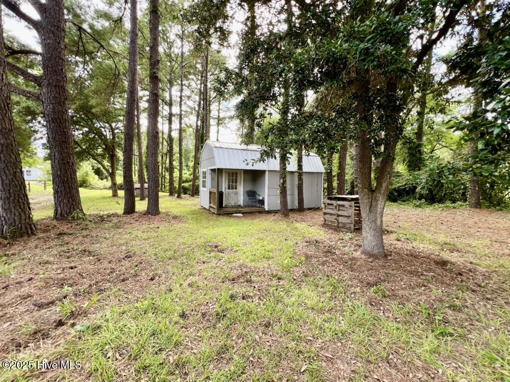 113 Old Farm Road Hampstead, NC 28443 - Photo 24 of 32 Front Yard Shed