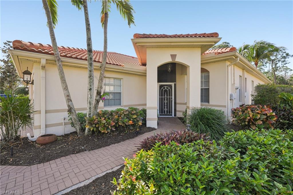3553 Periwinkle Way Naples, FL 34114 - Photo 2 of 43 Mediterranean / spanish home with stucco siding and a tiled roof