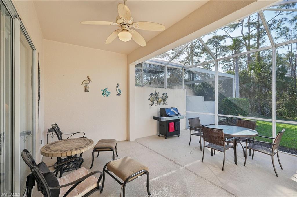 3553 Periwinkle Way Naples, FL 34114 - Photo 31 of 43 Sunroom / solarium featuring a wealth of natural light and a ceiling fan