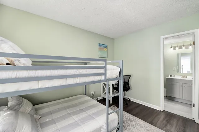 a bedroom with a bed and furniture