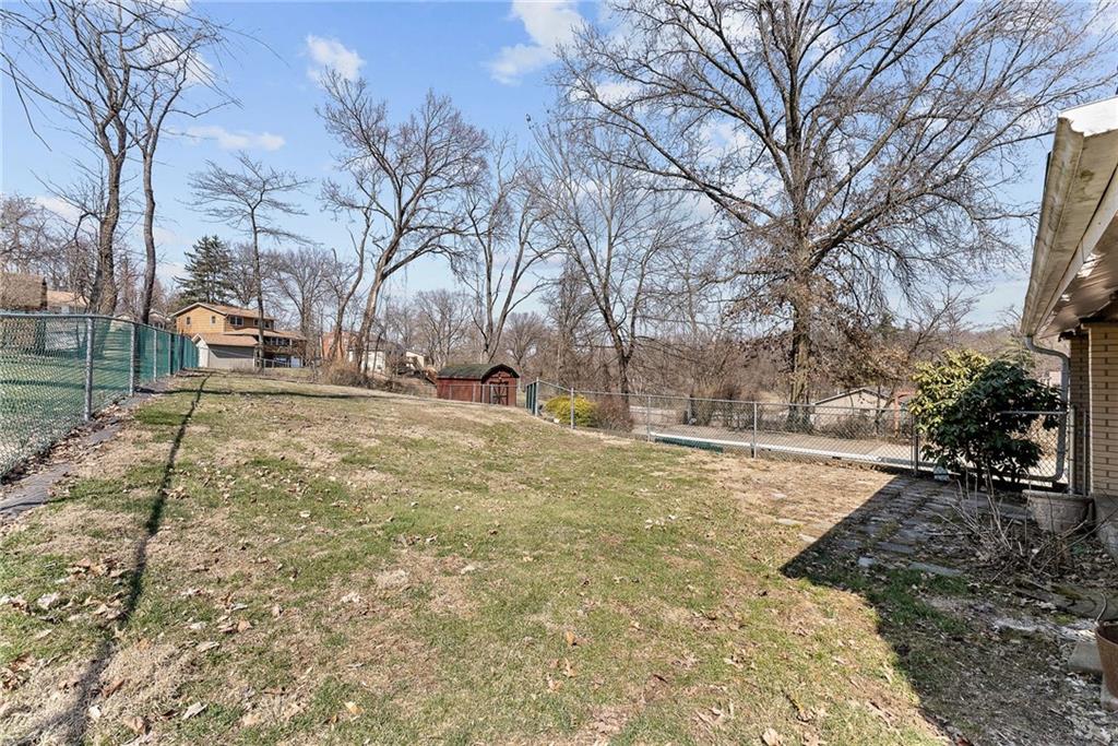 1008 Thorn Run Road Coraopolis, PA 15108 - Photo 26 of 28 a view of a yard with snow on the road