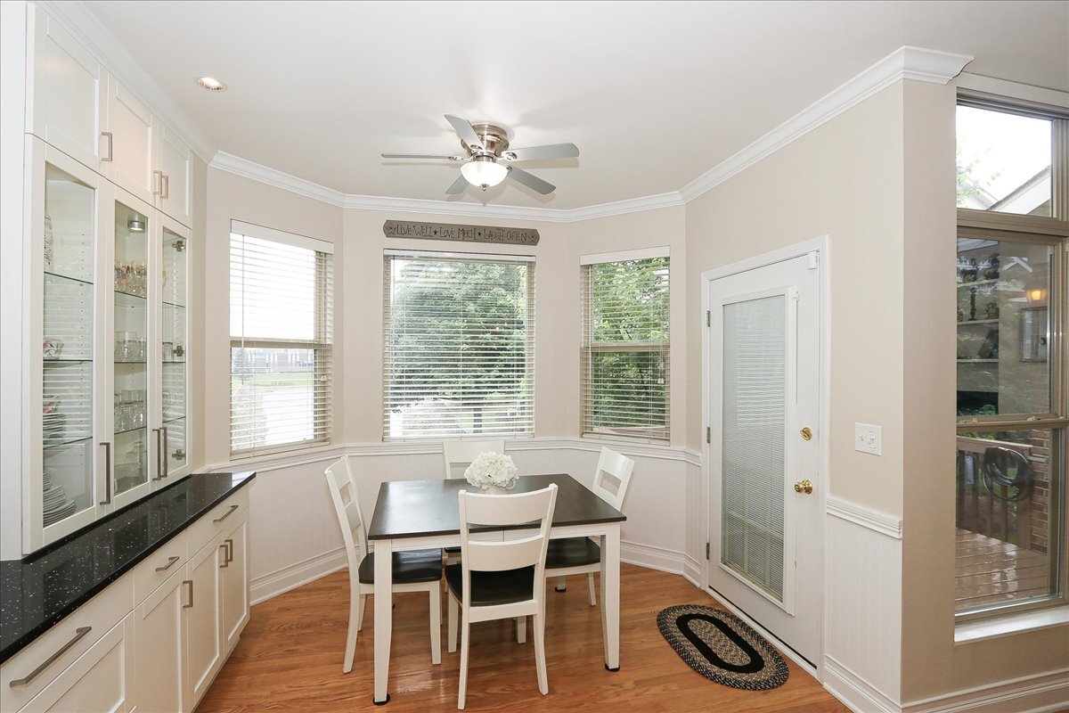 768 St Johns Place Addison, IL 60101 - Photo 19 of 39 a view of a dining room with furniture window and outside view