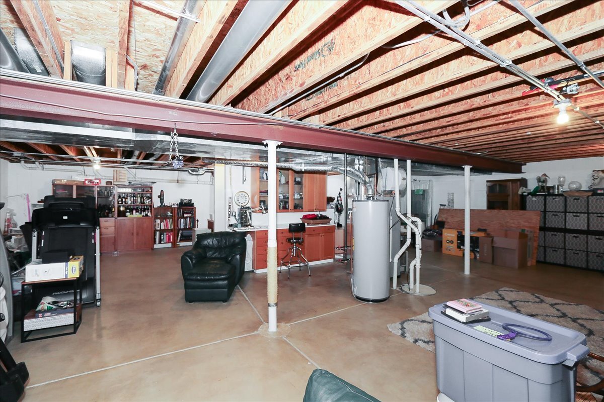 768 St Johns Place Addison, IL 60101 - Photo 31 of 39 a view of a storage room with racks on the wall