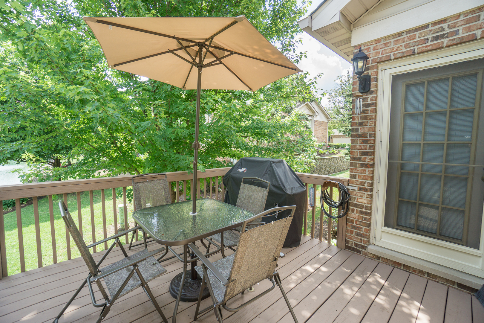 768 St Johns Place Addison, IL 60101 - Photo 33 of 39 a balcony with table and chairs
