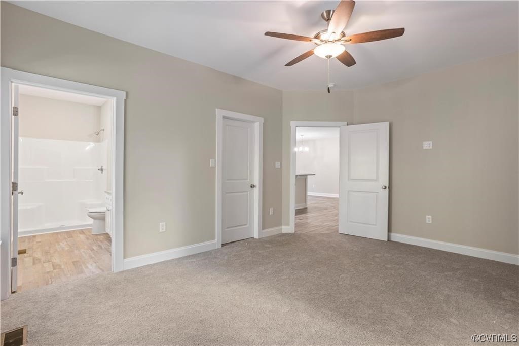 3734 Fredericks Hall Road Mineral, VA 23117 - Photo 6 of 9 a view of empty room with a ceiling fan