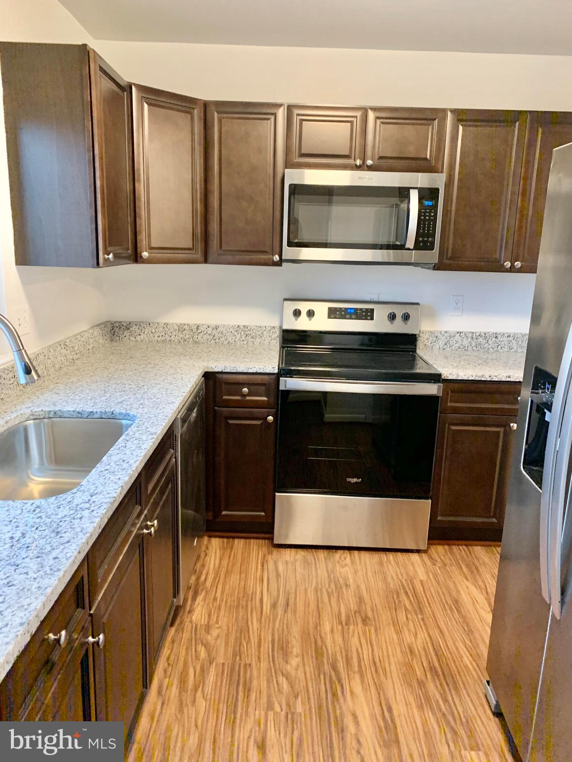 15702 Dorset Road, Unit 138 Laurel, MD 20707 - Photo 14 of 25 UPDATED KITCHEN HAS GRANITE