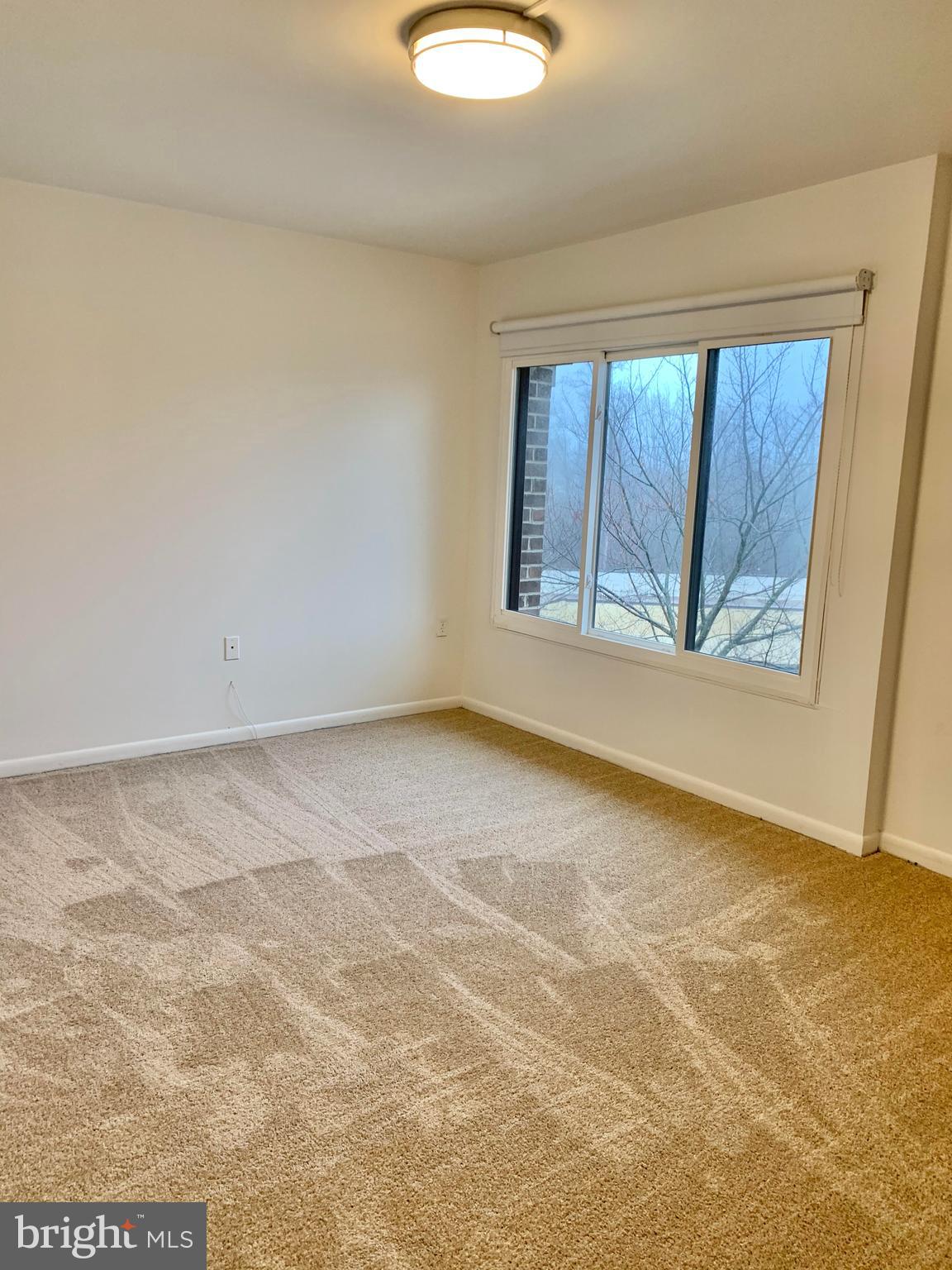 15702 Dorset Road, Unit 138 Laurel, MD 20707 - Photo 17 of 25 MASTER BED NEW LIGHT FIXTURE