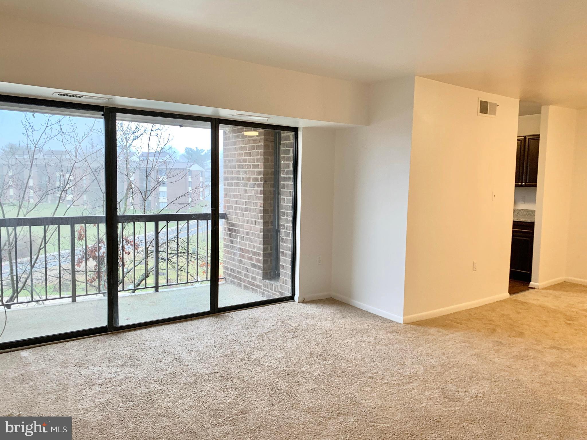15702 Dorset Road, Unit 138 Laurel, MD 20707 - Photo 7 of 25 BALCONY OFF LIVING ROOM