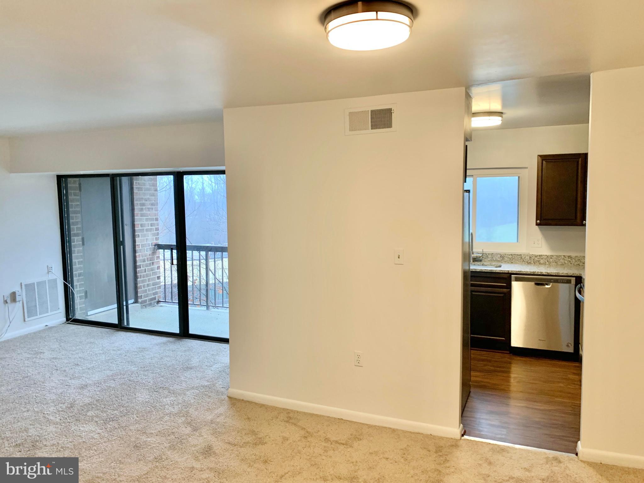 15702 Dorset Road, Unit 138 Laurel, MD 20707 - Photo 8 of 25 KITCHEN ENTRANCE OFF DINING ROOM