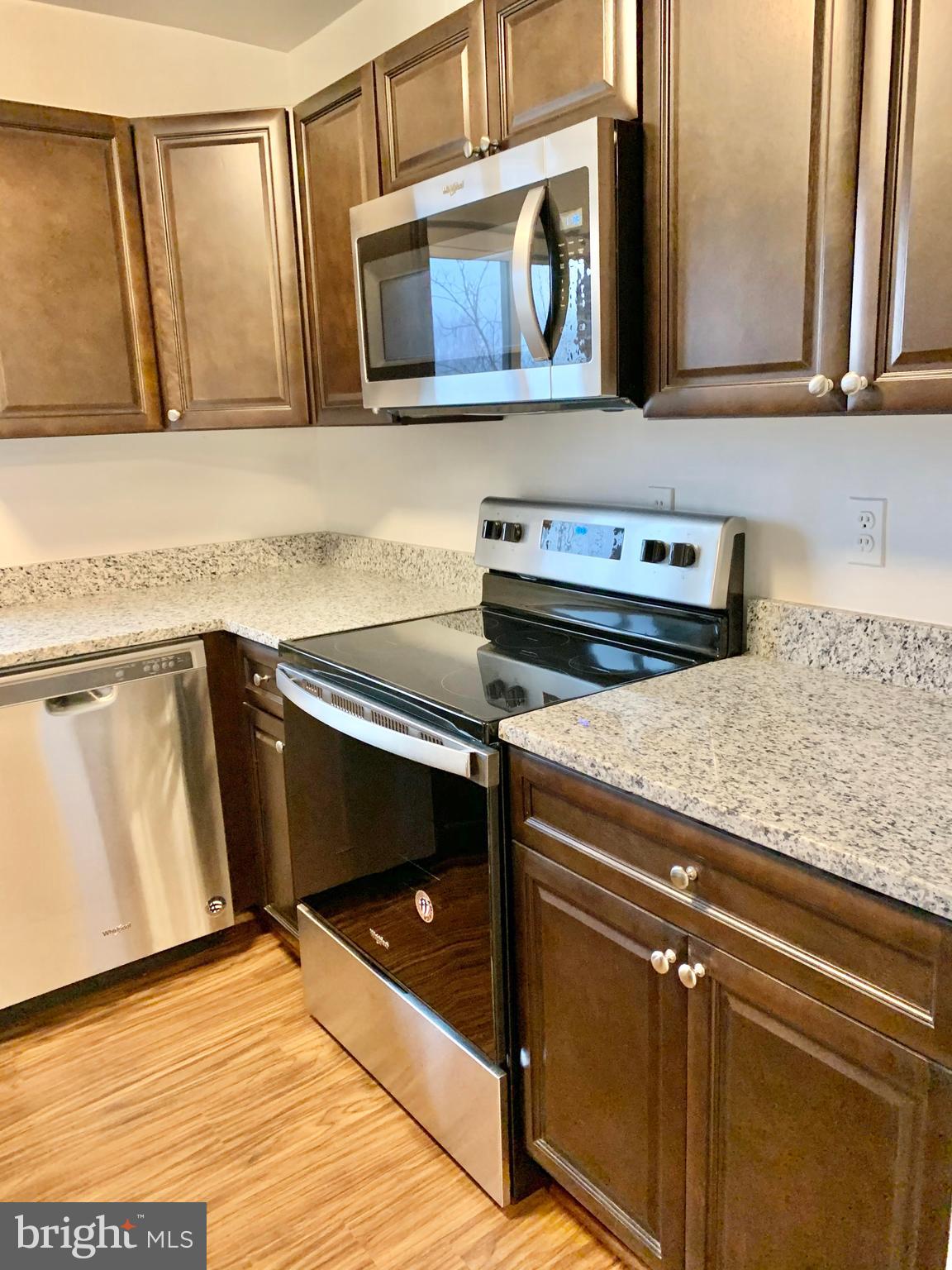 15702 Dorset Road, Unit 138 Laurel, MD 20707 - Photo 10 of 25 NEW 5 BURNER ELECTRIC STOVE AND MICROWAVE