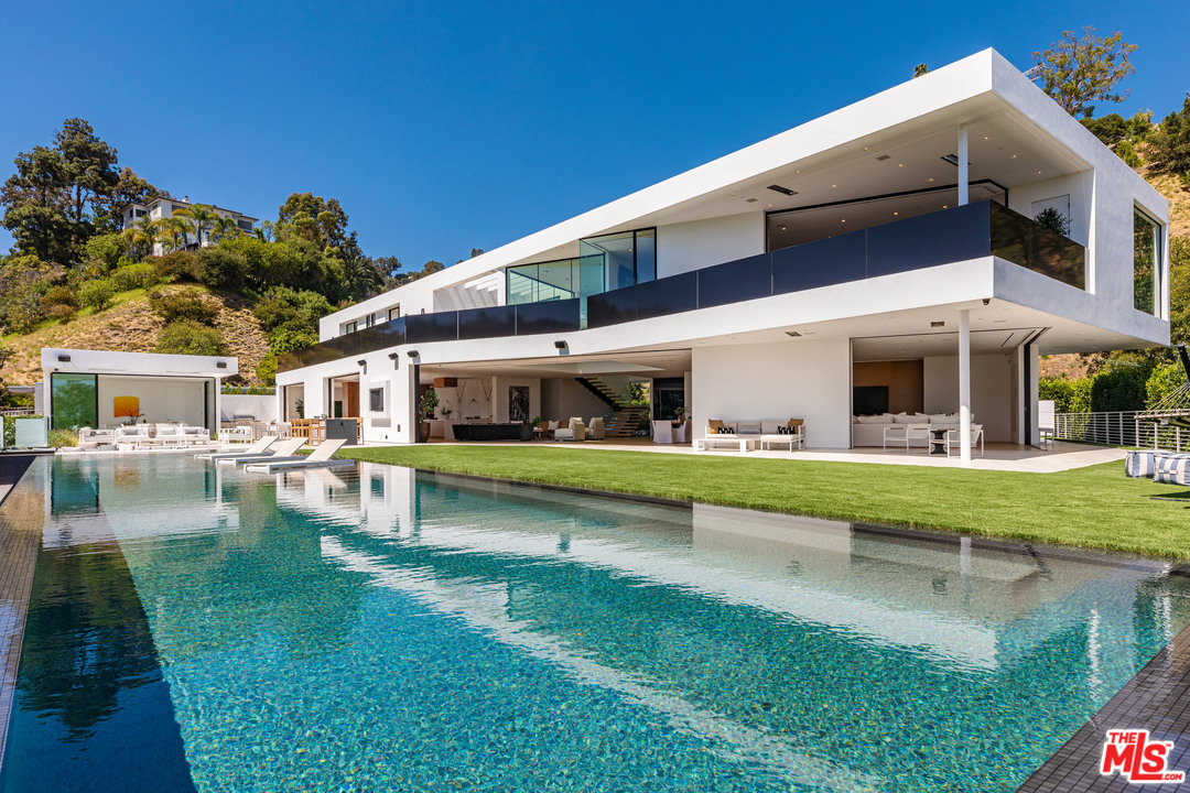 1259 Beverly Estate Drive Beverly Hills, CA 90210 - Photo 14 of 43 a view of house with swimming pool outdoor seating