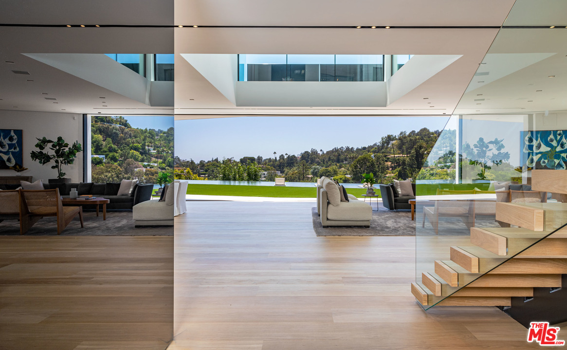 1259 Beverly Estate Drive Beverly Hills, CA 90210 - Photo 5 of 43 a view of outdoor living room with patio and a garden