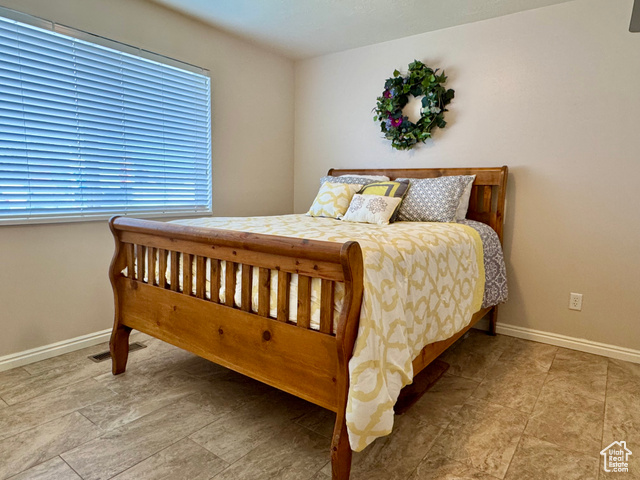 445 Topaz Boulevard, Unit 10 Delta, UT 84624 - Photo 15 of 28 Bedroom with baseboards