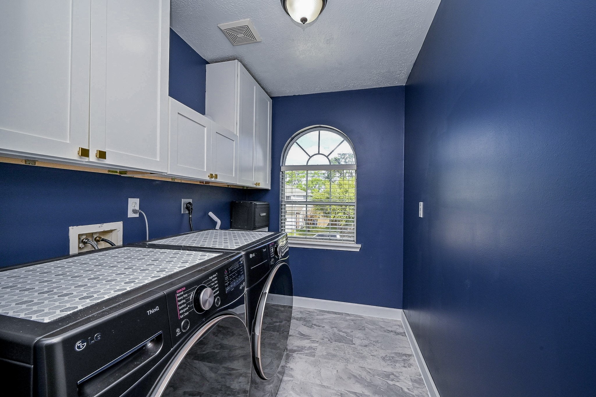 2534 Halstead Drive Spring, TX 77386 - Photo 32 of 35 Don't you just love a window in the laundry room for natural light! New flooring in this spacious laundry room located upstairs. No need to haul clothes up and down the stairs.