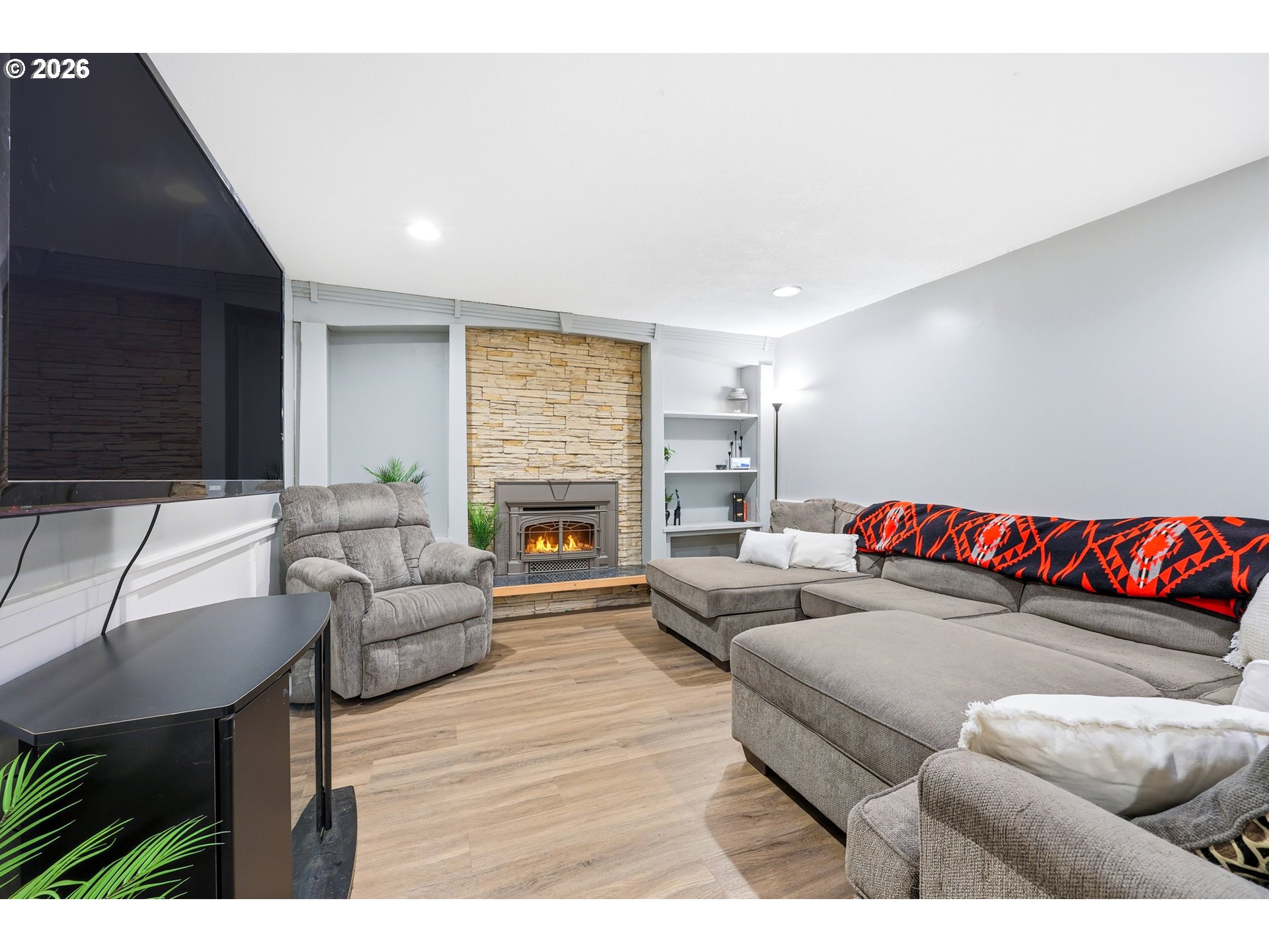 2073 Southeast Kane Avenue Gresham, OR 97080 - Photo 11 of 25 a living room with furniture and a fireplace
