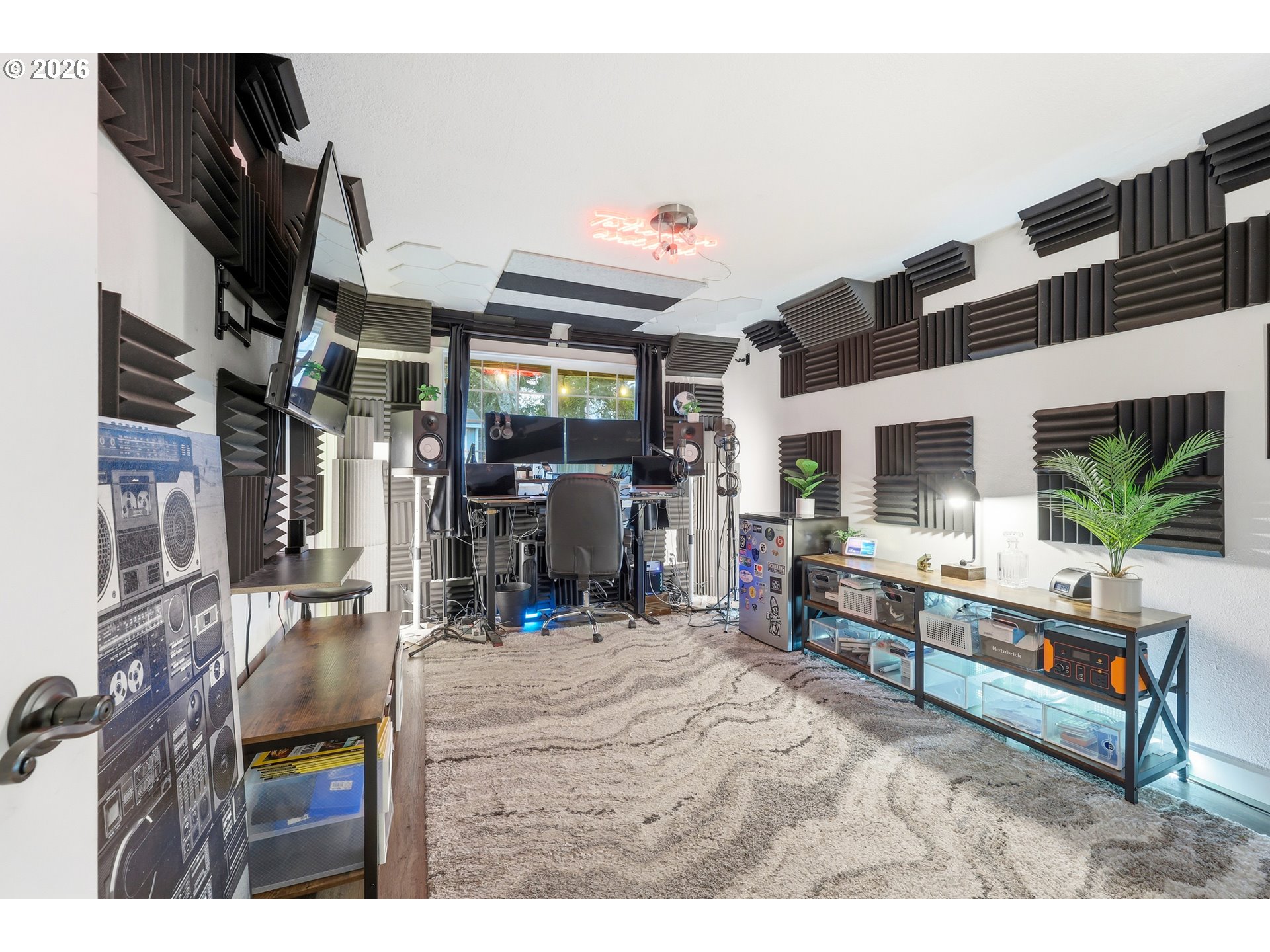 2073 Southeast Kane Avenue Gresham, OR 97080 - Photo 16 of 25 a bedroom with furniture and a large window