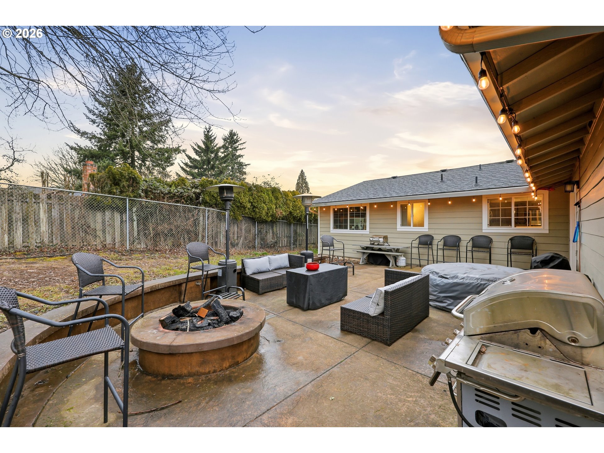 2073 Southeast Kane Avenue Gresham, OR 97080 - Photo 22 of 25 a view of a patio with couches chairs and a potted plant