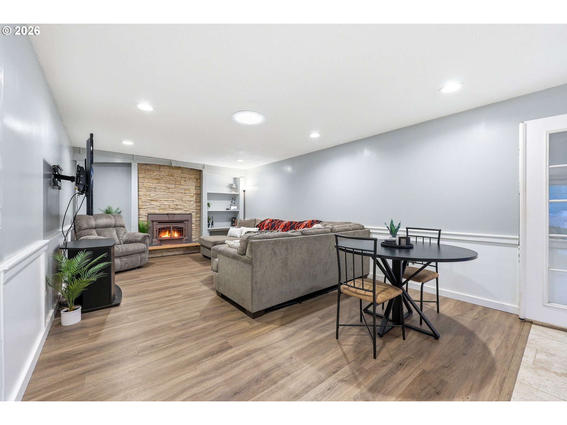 2073 Southeast Kane Avenue Gresham, OR 97080 - Photo 10 of 25 a living room with furniture and a wooden floor