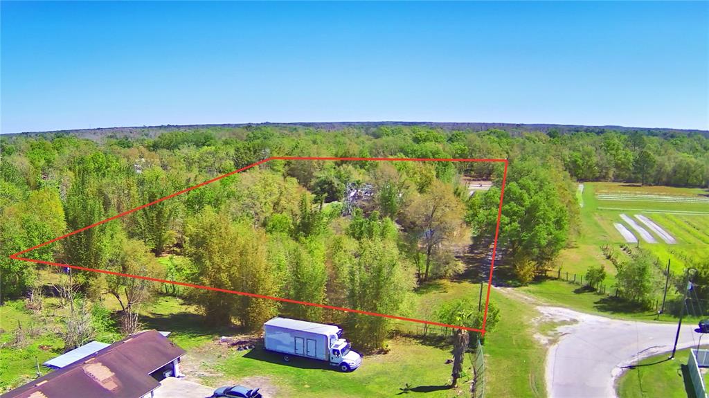 a view of a yard with an outdoor space