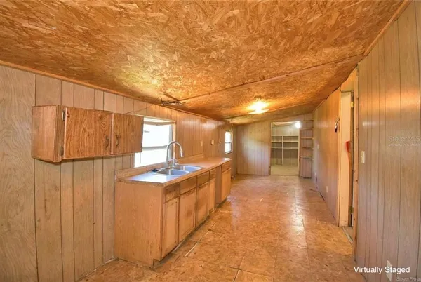 a view of a yard with swimming pool