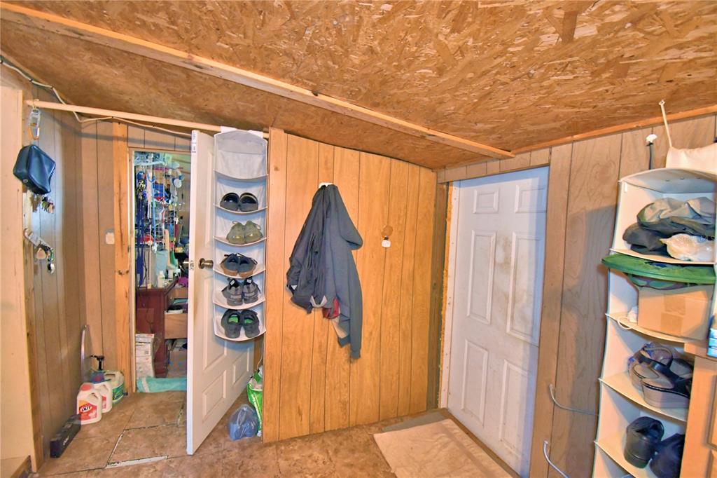 2039 Ranchland Drive Lakeland, FL 33809 - Photo 21 of 93 a view of walk in closet with clothes and shoes