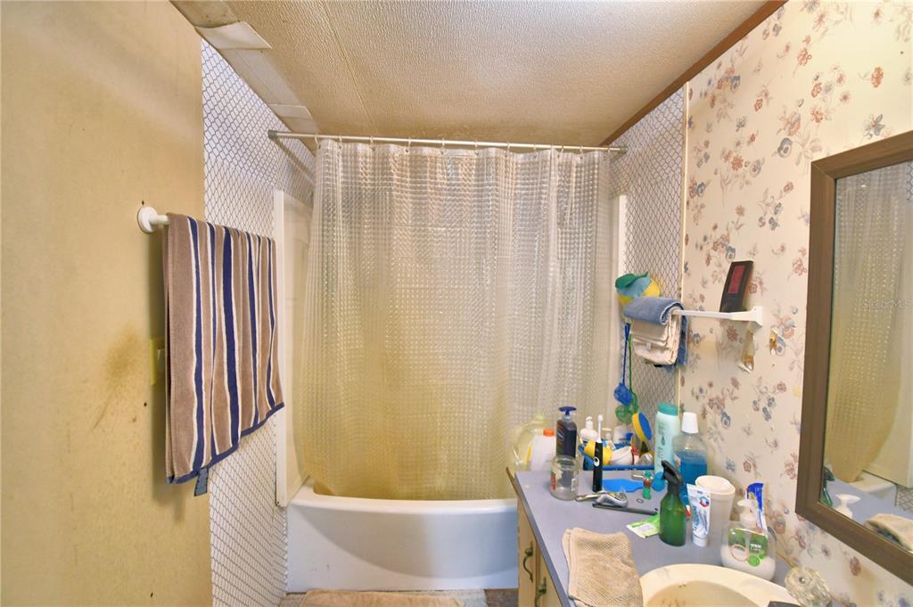 2039 Ranchland Drive Lakeland, FL 33809 - Photo 37 of 93 a bathroom with a sink toilet and shower