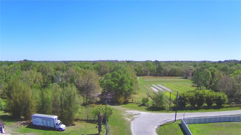 2039 Ranchland Drive Lakeland, FL 33809 - Photo 4 of 93 a view of a lake with a yard